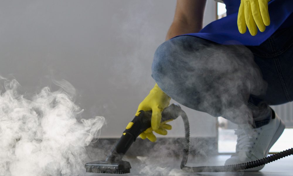 professional-cleaning-service-person-using-steam-cleaner-office (1)